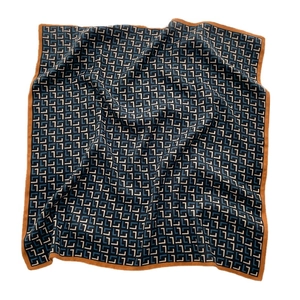 L-patterned silk scarf in navy blue and grey with orange trim on white background