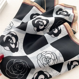 Elegant black and white camellia pattern silk scarf with houndstooth and contrast borders