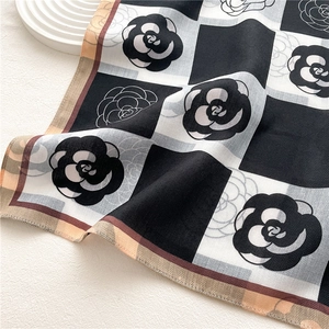 Elegant checkerboard silk scarf with camellia flower pattern and herringbone texture