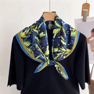 Floral print square silk scarf with botanical patterns and blue green striped border