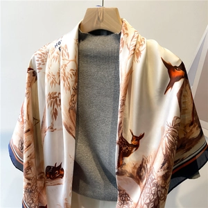 Retro silk scarf with forest deer pattern and blue border on elegant beige background