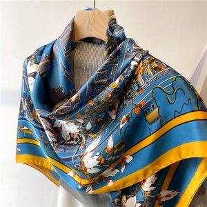 Detailed view of large floral satin scarf with intricate Chinese style bird and flower patterns