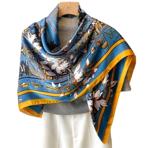 Blue silk scarf with white magnolia flowers and traditional architecture patterns