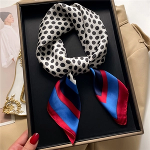 Polka dot and geometric striped silk scarf for women in a stylish gift box setting