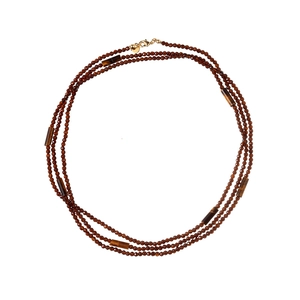 Three-layer beaded necklace with cylindrical tiger eye stones and gold lobster clasp