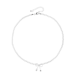 Elegant pearl necklace with silver bow pendant and teardrop pearl drop on white background