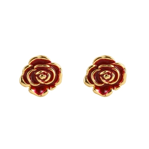 Close-up of red enamel rose flower earrings with gold-plated metal petal edges