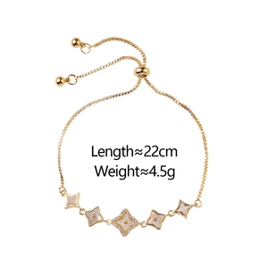 Adjustable four-leaf clover bracelet in gold finish with micro-inlaid zircon and white shell