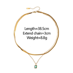 Double-layered gold necklace set with snake chain and green zircon rectangular pendant