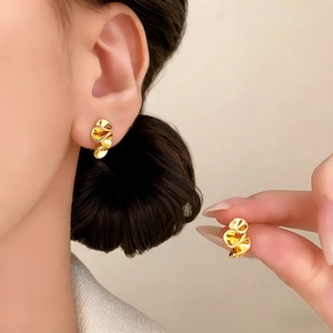 Elegant gold flower petal stud earrings with polished twisted design for women
