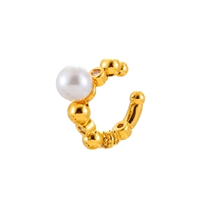 Minimalist gold plated ear cuff with white pearl and sparkling crystal accents on white background