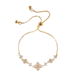 Elegante bracciale regolabile a quadrifoglio con conchiglia bianca e accenti di zircone