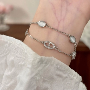 Bracciale a doppio strato in argento con pietre occhio di gatto e maglia ovale