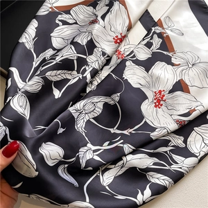 Elegant 110cm silk satin scarf with black and white floral print and smooth glossy finish
