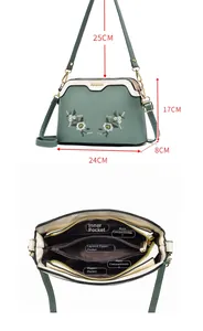 Detailed view of green embroidered shell bag showing 5-layer interior and exact dimensions