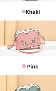 Detailed embroidery floral pattern on khaki, pink and green leather shell bags
