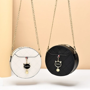 Chic quilted round chain crossbody bag for women with cat-shaped pendant detail