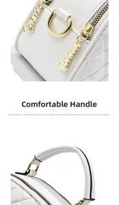 Detailed view of white quilted leather bag with premium gold hardware and zipper