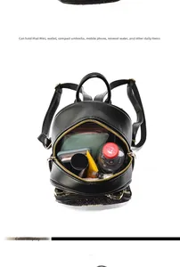 Detail view of black sequin mini backpack showing large capacity for iPad and daily items