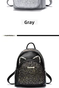 Close-up of sequin mini backpack with cute cat ears and sparkling rhinestone details