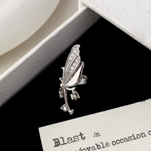 Silver butterfly ear cuff with sparkling zircon inlay and elegant fringe drop detail