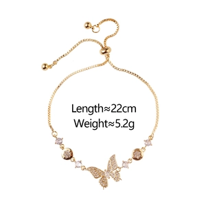 Elegant gold butterfly bracelet with pavé cubic zirconia and adjustable slide chain