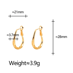 Minimalist gold teardrop geometric hoop earrings with polished oval silhouette