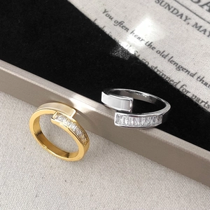 Elegant shell wrap ring with rectangular cubic zirconia in gold and silver finish