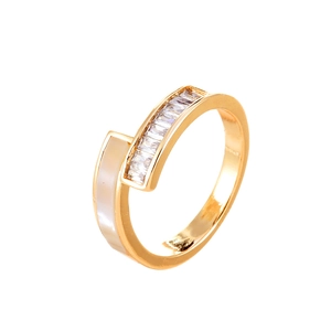 Minimalist gold adjustable shell ring featuring rectangle zircon accents and crossover design