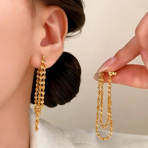 Elegant gold tassel earrings featuring refined spiral twist chains for women