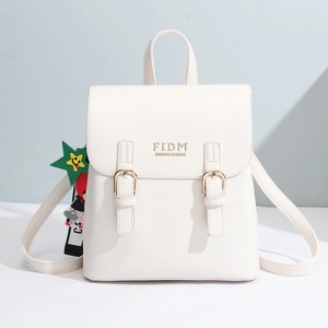 Sac à dos chic en similicuir blanc cassé avec double boucle et pendentif étoile