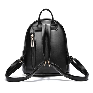 Back view of black sequined mini backpack for women featuring anti-theft zipper and gold hardware