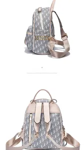 Detail of light grey monogram backpack featuring gold studs and luxury metal hardware