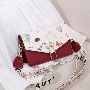 Retro contrast shoulder bag with Eiffel Tower print and owl buckle on white textile