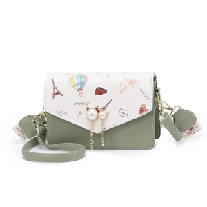 Green and cream crossbody small square bag with travel prints and pearl cat clasp
