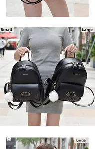 Comparison of large and small black faux leather backpacks with cat metal decor and quilting