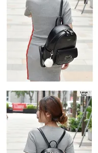 Outdoor street view of the large black PU leather backpack with cute cat ears and fur ball