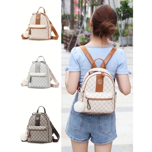 Women's faux leather mini backpack with monogram pattern and plush pompom charm in three colors