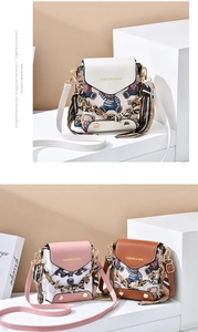 Detailed view of mini crossbody bag with silk scarf chain and cartoon prints