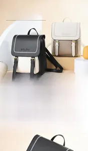Detail of color-block PU leather backpack with rose embossing and contrast stitching