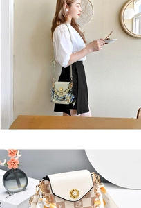 Detailed close-up of plaid mini crossbody bags with decorative scarves and metal locks