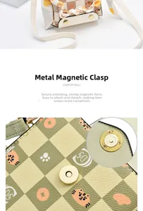 Detail of checkered mini crossbody bag with cat prints and golden magnetic clasp