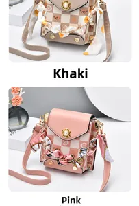 Detail of mini crossbody bags featuring checkerboard prints, cat motifs, and silk scarf handles