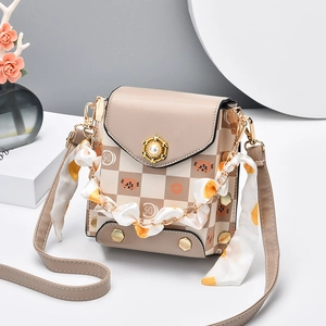 Mini crossbody bag with beige checkerboard print, cartoon cat detail and silk scarf handle