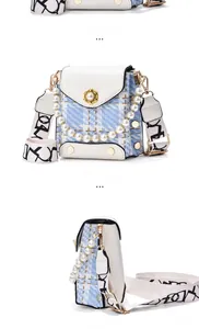 Detailed view of mini checkered handbag with pearl buckle and printed crossbody strap
