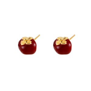 Elegant persimmon-shaped red enamel stud earrings with gold-tone accents in a minimalist style