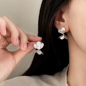 Sparkling silver flower stud earrings for women with layered petals and matte finish