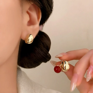 Minimalist gold teardrop earrings with elegant red pearl drop charms for women