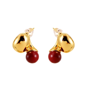 Elegant cherry-shaped stud earrings with gold leaves and red pearls on white background