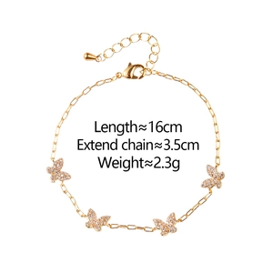 Detail of gold butterfly bracelet showing 16cm length and 3.5cm extension chain